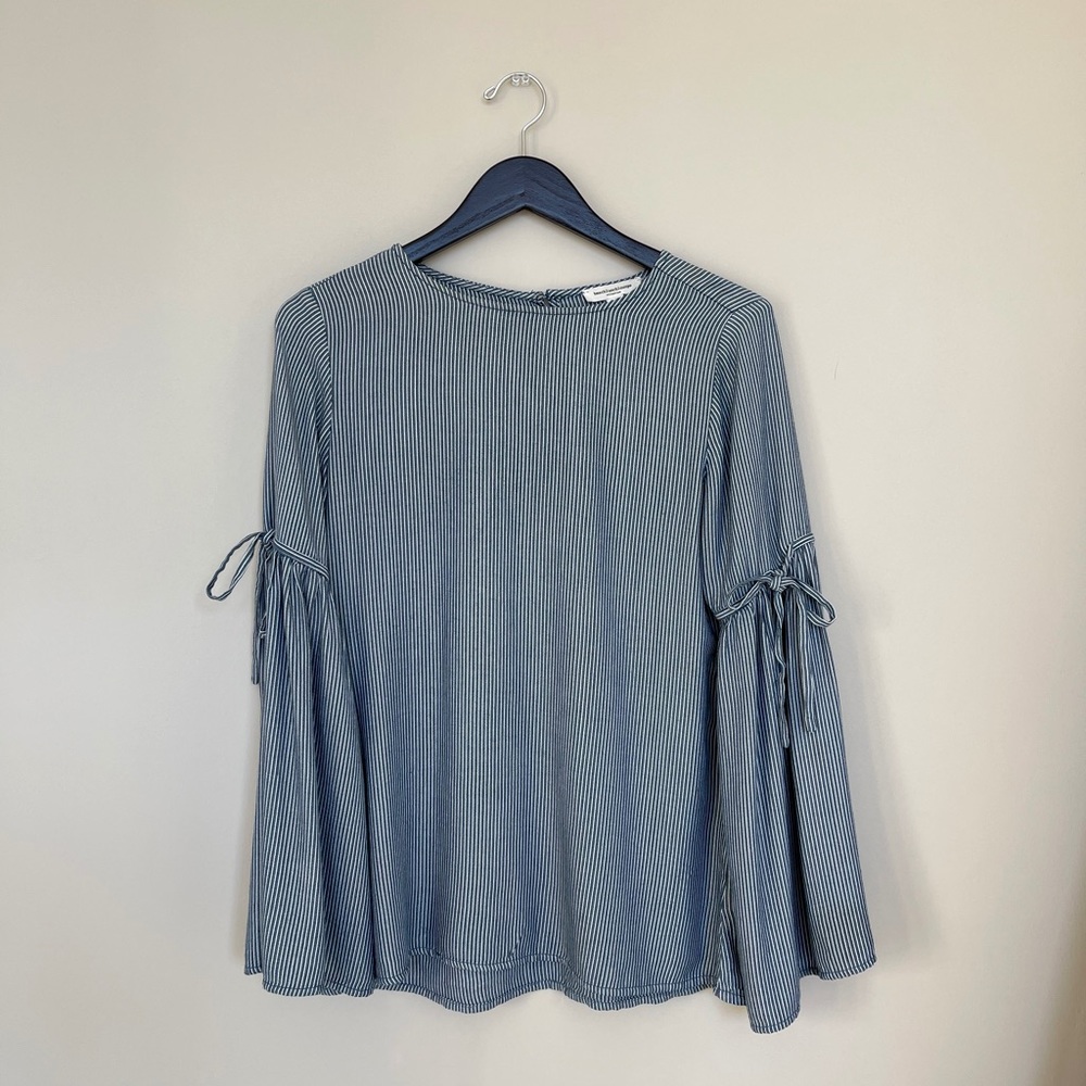 Long sleeve blue and white striped top